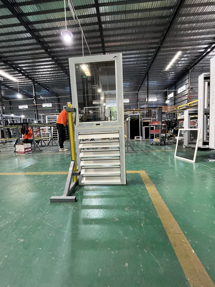 White door assembly with an open lower louvered section at the WANSLEY factory